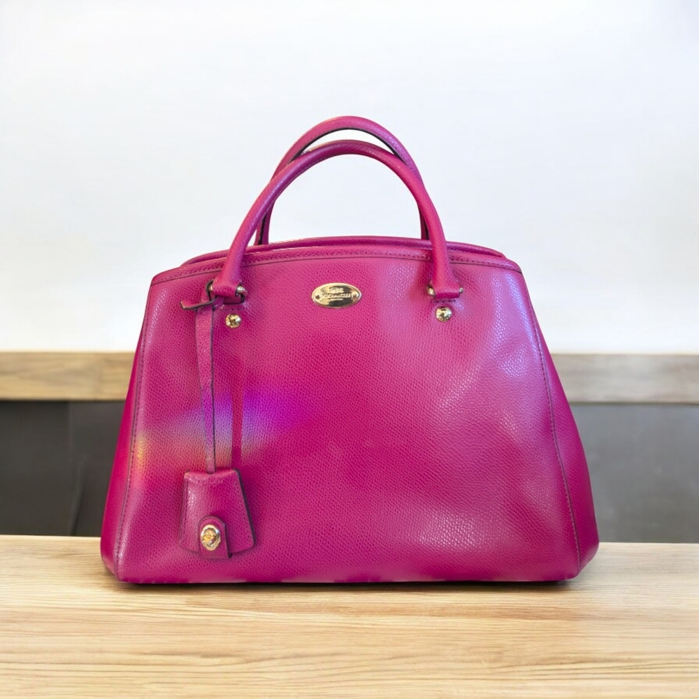 Vibrant Pink Satchel with Structured Shape and Gold Accents